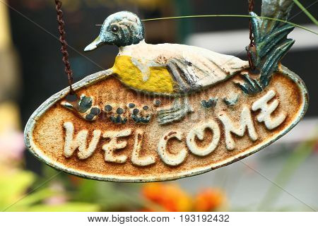 Symbolize welcome on background with the nature