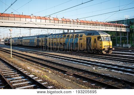MAASTRICHT NETHERLANDS - JANUARY 17 2016: A passenger train. The main railway station. Railway transport of the Netherlands.
