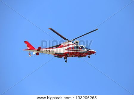 Veneto, Italy - May 26, 2016: Helicopter Of Italian Firefighters Flying High During Rescue Operation