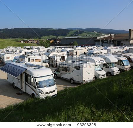 Asiago, Vi, Italy - May 27, 2017: Campers In The Parking Lot After The Cycling Race Called Giro Di I