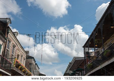 NEW ORLEANS, LA - APRIL 13: View of Street in the French Quarter of New Orleans, Louisiana showing historic buldings with unique architecture on April 13, 2014