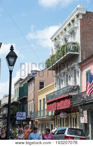NEW ORLEANS, LA - APRIL 13: View of Street in the French Quarter of New Orleans, Louisiana showing historic buldings with unique architecture on April 13, 2014