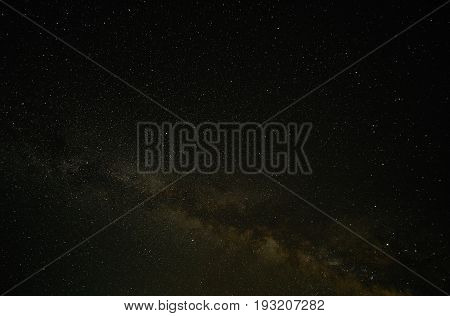 Night landscape with colorful Milky Way. Amazing summer Starry sky . Beautiful Universe. Space background