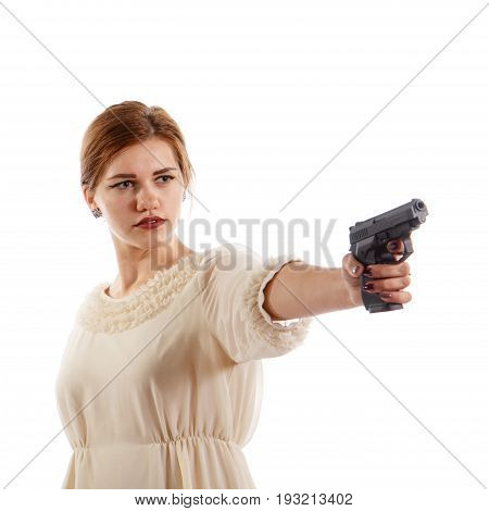 A young lady aiming a handgun on white background