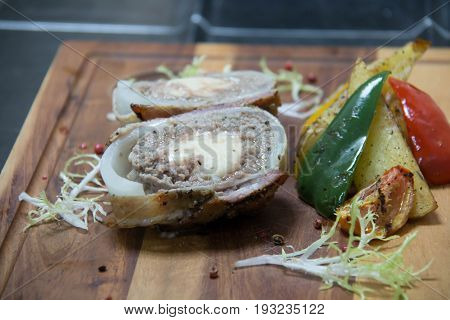 A Fried meatballs on wood with vegetabel