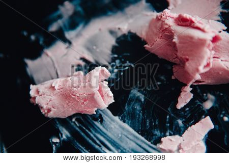 Ice cream roll fried in the fridge freezer pan on the street in Thailand fresh cooking made from fresh strawberries milk blueberries. Concept of tourist delicacy.