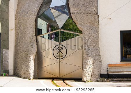 Bad Gastein Austria - JUNE 09 2017: Entrance for the railway into the mountain. At the health Resort Paselstollen a former Gold mining tunnel Bad Gastein Austria Europe.