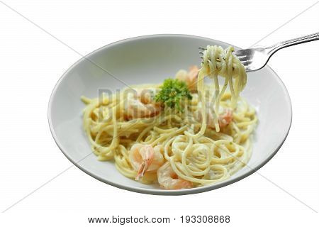 Spaghetti Carbonara or white cream sauce pasta with shrimp.