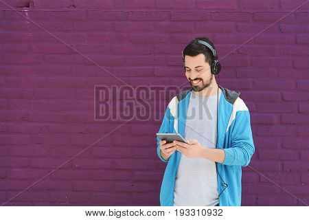 Portrait Of Man Using A Tablet.