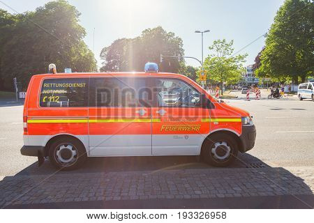 KIEL / GERMANY - JUNE 20 2017: german emergency doctor car from fire department drives on a street.
