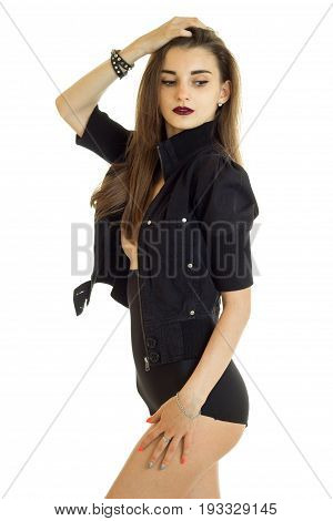 vertical portrait of attractive sexual girl with dark lips and the black body is isolated on a white background