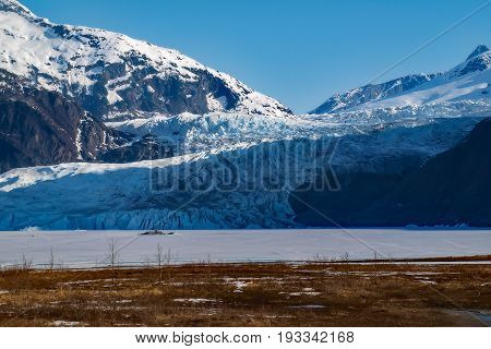 Mendenhall Glacier flowing down at Alaska's Inside Passage