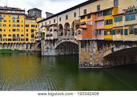 Ponte Vecchio bridge on the river in Florence Italy