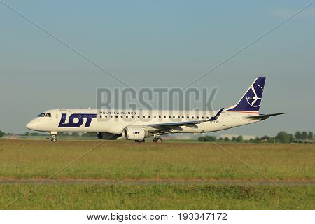 Amsterdam the Netherlands - June 1st 2017: SP-LND LOT - Polish Airlines Embraer ERJ-195LR taking off from Polderbaan Runway Amsterdam Airport Schiphol