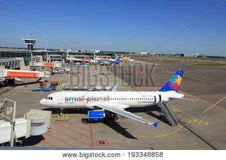 Amsterdam The Netherlands - May 26th 2017: D-ABDB Small Planet Airlines Germany Airbus A320 at the gate at Schiphol International Airport