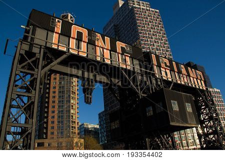 Transfer bridges, support gantries at Gantry Plaza State Park with blue sky