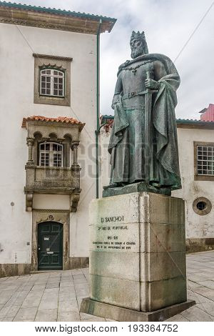GUARDA,PORTUGAL - MAY 15,2017 - Monument of King Dom Sancho I. near Caathedral of Guarda in Portugal. The Cathedral of Guarda is a Roman Catholic church .