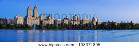Panoramic view of Central Park West and the Jacqueline Kennedy Onassis Reservoir at dawn. Upper West Side Manhattan New York City