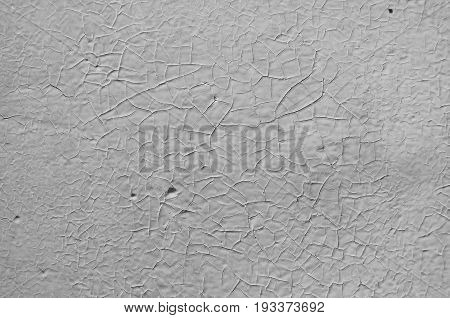 The background gray color the old paint on the stone