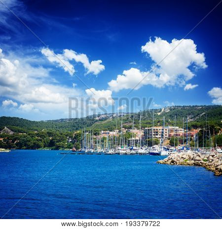 seascape with clear calm mediterranean sea waters with yachts and sunner sky, Martigues, Provence, Cote dAzur, France, retro toned