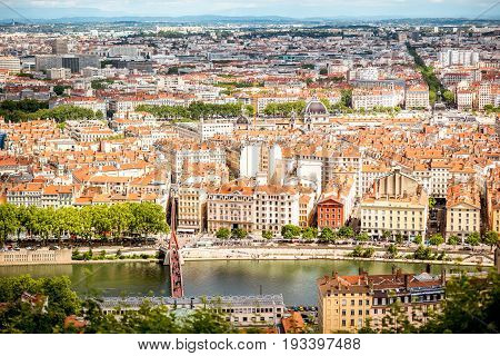 Aerial cityscape view with beautiful old buildings and Rhone river in Lyon city
