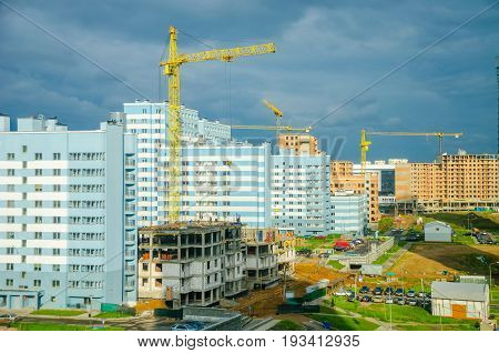 Belarus, Minsk - May 15/2016: Builders Create A High-rise Building In Lebyazhy District Of The City.