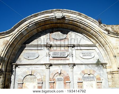 Arabic script on the wall of Mahmoudiya Mosque in old city Jaffa Israel