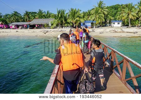 Labuan,Malaysia-May 1,2017:An unidentified people visiting at Rusukan Besar island in Labuan,Malaysia.It is very popular place for tourist to visit & also for those who like snorkeling underwater