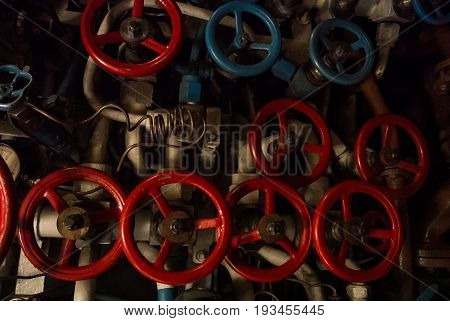 Kaliningrad, Russia - June 12 2017: Close-up View Of Red And Blue Valves Of Different Sizes, A Machi