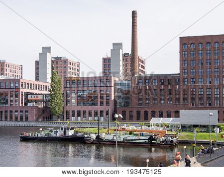 BERLIN GERMANY - JUNE 21 2017: Boats And Buildings At Tempelhofer Hafen Meaning Harbor of Tempelhof In German Language In Berlin
