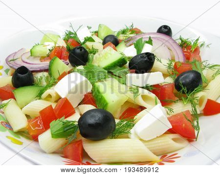 greek salad with cheese olive tomato and pasta