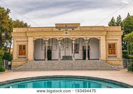 YAZD, IRAN - MAY 5, 2015: Tourists visiting the zoroastrian fire temple Atash Behram in old city.