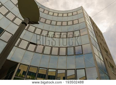 A building with reflections of the sky