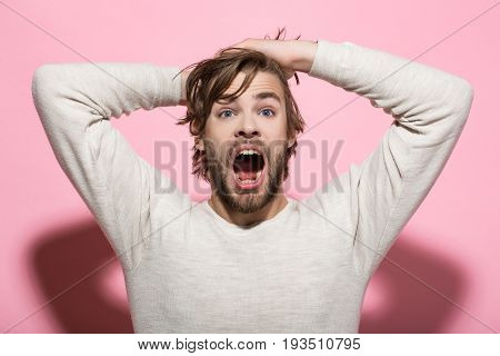 Surprised Man With Long Uncombed Hair Wake Up In Morning