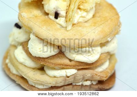 Close view on cake called italian cremeschnitte isolated on white background