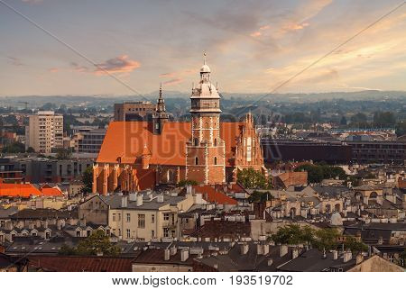 Roofs and the church in sunset light. Krakow Poland.