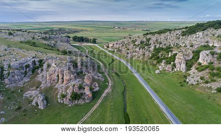 mountain landscape with some of the oldest limestone rock formations in Europe in Dobrogea Gorges (Cheile Dobrogei) Romania