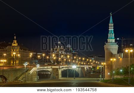 RUSSIA MOSCOW MAY 27 2017: The twightlight from the Red square behind the Saint Basil Church night view beautiful and the bridge into the Red square and Kremlin Palace.