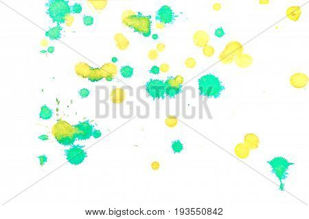 Abstract two-color yellow green ink splash. Ink blots. Elements of design. The water-soluble ink on white paper Leste. Abstractionism