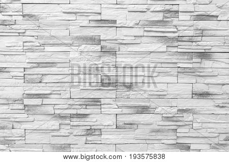 Brick wall background / Old gray Bricks Wall Pattern brick wall texture or brick wall background on day noon light for interior or exterior brick wall building and brick wall decoration texture.