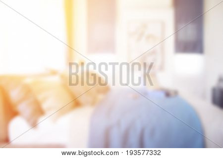 Defocus Blue Scheme Bedroom Interior With Briefcase On Bed