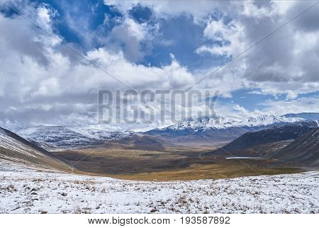 Autumn landscape of Altay. Sunset in the steppe beautiful evening sky with clouds plato Ukok no one around Altai Siberia Russia