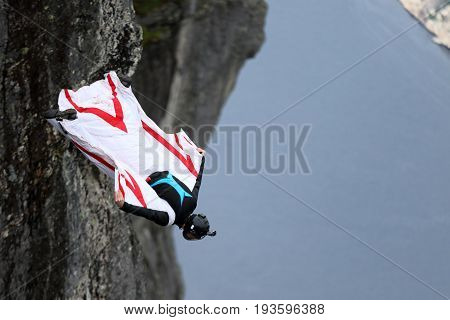 Skydiving over beautiful Norway. Clouds, sun and sky