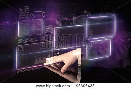 Male hands touching interactive table with purple cloudspace graphic on it 