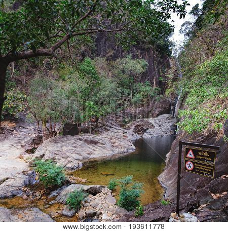 Khlong Phlu waterfall in deep forest at Mu Koh Chang National Park, Chang island, Thailand.