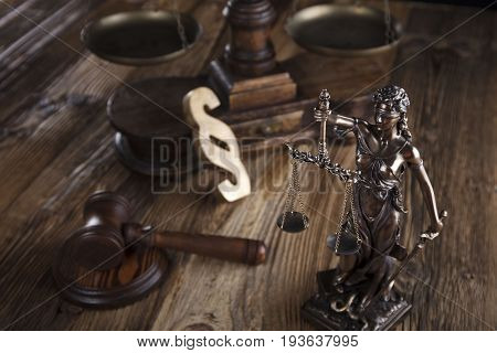 Justice concept, Themis, gavel and scale on wooden table.