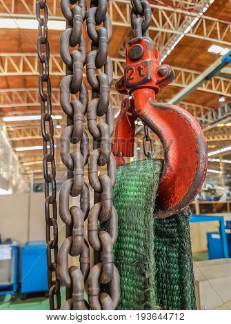 Steel hook and chain of crane in factory