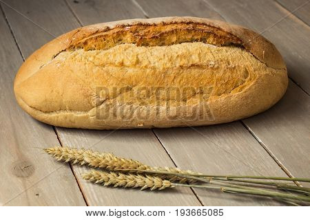 Homemade Baked Bread Flour And Wheat On Light Wooden Background