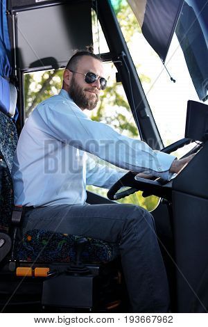 Bus driver. A handsome bus driver in the bus