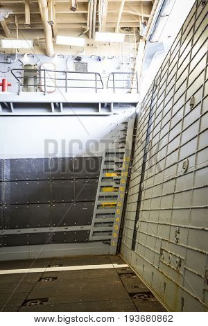 Ship Tour USS Kearsarge (LHD 3) Wasp-class amphibious assault ship: Stern ramp gate with painted numbers of water level gage. Fleet Week NEW YORK MAY 25 2017.